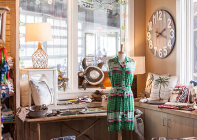 Marina store merchandise - women's dress, clock and nautical themed lamp.